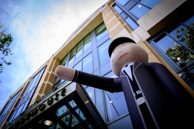 An Elon Musk inflatable makes a nazi salute outside the federal courthouse during proceedings in the trial of Elon Musk VS. OpenAI in Oakland, California, on May 12, 2026. Musk, the founder of Tesla and SpaceX, alleges that Altman and co-founder Greg Brockman misappropriated his $38 million donations when OpenAI abandoned its original nonprofit and philanthropic mission to become the for-profit giant behind ChatGPT. (Photo by JOSH EDELSON / AFP)