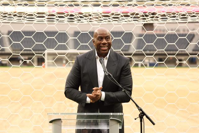 Earvin “Magic” Johnson, Los Angeles World Cup 2026 Community Ambassador, speaks during the 30 Days to FIFA World Cup 2026 media event at SoFI Stadium before the pitch installation and temporary renaming to Los Angeles Stadium in Inglewood, California on May 12, 2026. The US Men's National Team will play their first 2026 FIFA World Cup match on June 12 against Paraguay. (Photo by Patrick T. Fallon / AFP)