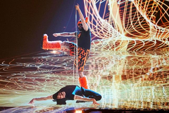 Greek singer Akylas Mytilinaios, aka Akylas and representing Greece with the song 'Ferto', performs during the first semi-final of the Eurovision Song Contest 2026 (ESC) at Wiener Stadthalle in Vienna, Austria on May 12, 2026. (Photo by GEORG HOCHMUTH / APA / AFP) / Austria OUT