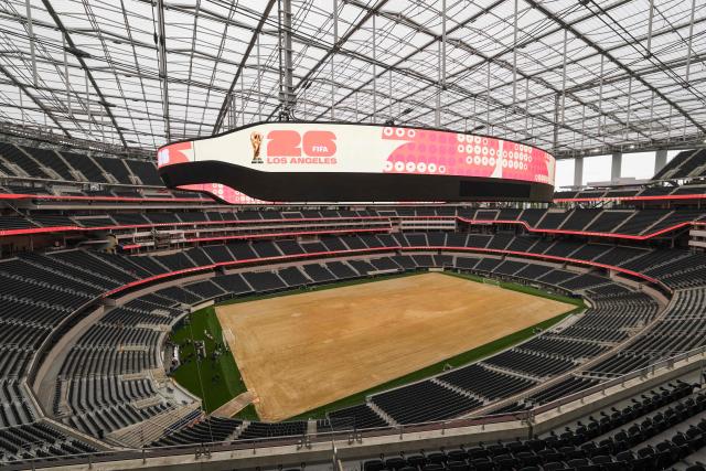 An expanded pitch surface area, which required the removal of corner seating and a raised custom field platform, awaits the installation of grass during the 30 Days to FIFA World Cup 2026 media event at SoFI Stadium before the pitch installation and temporary renaming to Los Angeles Stadium in Inglewood, California on May 12, 2026. The US Men's National Team will play their first 2026 FIFA World Cup match on June 12 against Paraguay. (Photo by Patrick T. Fallon / AFP)