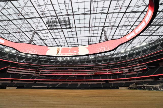 An expanded pitch surface area, which required the removal of corner seating and a raised custom field platform, awaits the installation of grass during the 30 Days to FIFA World Cup 2026 media event at SoFI Stadium before the pitch installation and temporary renaming to Los Angeles Stadium in Inglewood, California on May 12, 2026. The US Men's National Team will play their first 2026 FIFA World Cup match on June 12 against Paraguay. (Photo by Patrick T. Fallon / AFP)