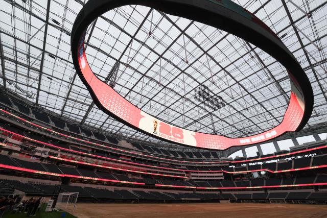 An expanded pitch surface area, which required the removal of corner seating and a raised custom field platform, awaits the installation of grass during the 30 Days to FIFA World Cup 2026 media event at SoFI Stadium before the pitch installation and temporary renaming to Los Angeles Stadium in Inglewood, California on May 12, 2026. The US Men's National Team will play their first 2026 FIFA World Cup match on June 12 against Paraguay. (Photo by Patrick T. Fallon / AFP)