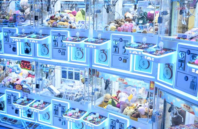 A photo taken on May 11, 2026 shows claw machines in an arcade centre at a shopping mall in Hong Kong. Authorities have proposed tightening the regulation of claw machine arcades by proposing a licensing program to curb potential addiction risks. (Photo by Peter PARKS / AFP)