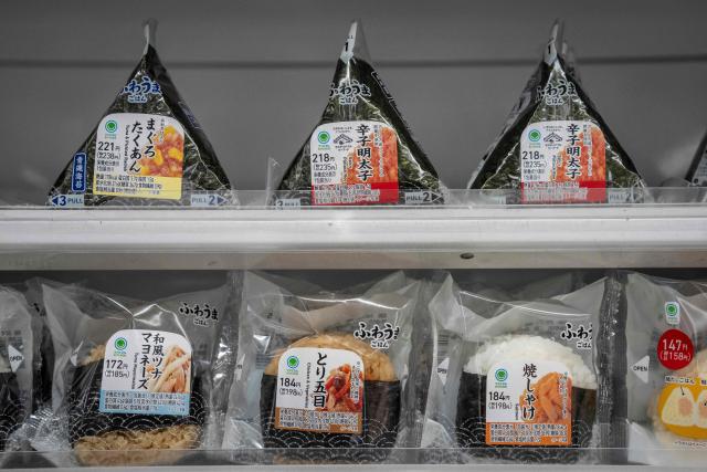 Onigiri rice balls are on display at a FamilyMart convenience store in Tokyo on May 13, 2026. (Photo by Yuichi YAMAZAKI / AFP)