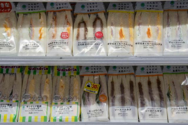 Sandwiches are on display at a FamilyMart convenience store in Tokyo on May 13, 2026. (Photo by Yuichi YAMAZAKI / AFP)