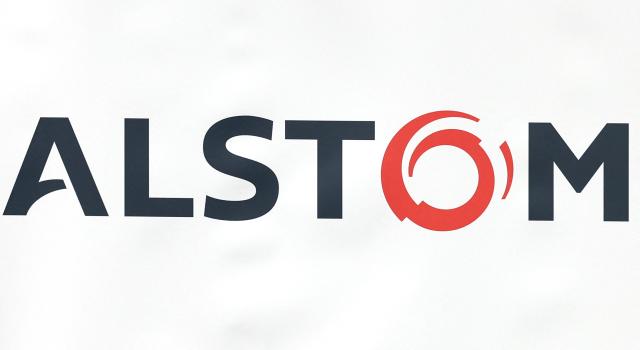 (FILES) This photograph shows the logo of Alstom, at a company plant during a press visit organized for the presentation of the first MI20 train that will be used by RATP and SNCF on the Оle-de-France lines, in Crespin, northern France, on May 7, 2026. Alstom announced on May 13, 2026, that its annual net profit had doubled to 324 million euros, with revenue up but the adjusted margin down to 6.1%, due to “execution difficulties” affecting some of its contracts, a reference to its delivery delays. (Photo by Francois LO PRESTI / AFP)