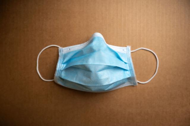 (FILES) A picture taken on May 19, 2020 in Toulouse southern France shows a protective surgical face mask as France eases lockdown measures taken to curb the spread of the COVID-19 pandemic caused by the novel coronavirus. In the event of an epidemic in France, which is not the case with the hantavirus at this stage, France has a stockpile of masks that would allow it to cope for “at least three months,” the French Prime Minister's press office said on May 13, 2026. (Photo by Lionel BONAVENTURE / AFP)