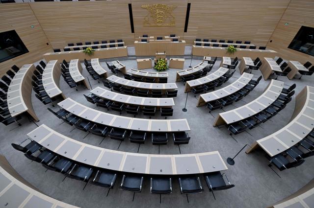 The still empty plenary hall of Baden-Wuerttemberg's regional parliament in Stuttgart, southern Germany, is pictured before the southern federal state's new State Premier will be sworn in. The inaugural session of the new state parliament of Baden-Wuerttemberg took place the day before, on May 12, 2026, following state elections on March 8, 2026. (Photo by THOMAS KIENZLE / AFP)