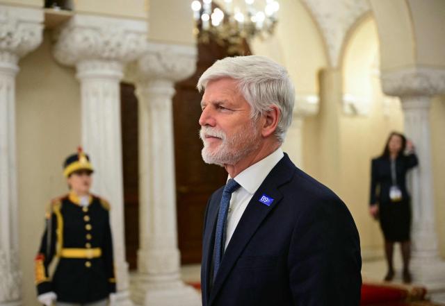 Czech Republic's President Petr Pavel arrives to attend the plenary session the summit of the Bucharest Nine (B9) and the Nordic countries at the Cotroceni Palace in Bucharest, Romania on May 13, 2026. The event is co-chaired by the President of Romania and the President of Poland under the overarching theme of 'Delivering More for Transatlantic Security' and will focus on transatlantic security and NATOs forthcoming summit in Ankara. The B9 format, also known as NATO's Eastern Flank, includes Bulgaria, the Czech Republic, Estonia, Hungary, Latvia, Lithuania, Poland, Romania and Slovakia. (Photo by Daniel MIHAILESCU / AFP)