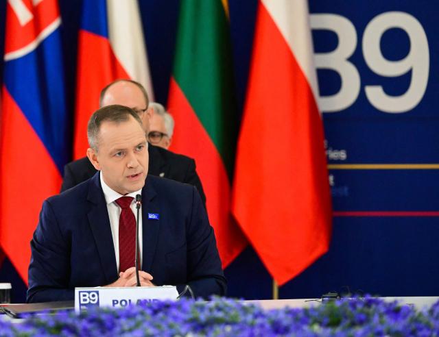 Poland's President Karol Nawrocki speaks at the start of the plenary the summit of the Bucharest Nine (B9) and the Nordic countries at the Cotroceni Palace in Bucharest, Romania on May 13, 2026. The event is co-chaired by the President of Romania and the President of Poland under the overarching theme of 'Delivering More for Transatlantic Security' and will focus on transatlantic security and NATOs forthcoming summit in Ankara. The B9 format, also known as NATO's Eastern Flank, includes Bulgaria, the Czech Republic, Estonia, Hungary, Latvia, Lithuania, Poland, Romania and Slovakia. (Photo by Daniel MIHAILESCU / AFP)