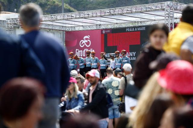 INEOS Grenadiers Colombian rider Egan Bernal (C) poses with his team ahead of the 5th stage of the Giro d'Italia 2026 - Tour of Italy cycling race between Praia a Mare and Potenza, southern Italy on May 13, 2026. (Photo by Luca Bettini / AFP)