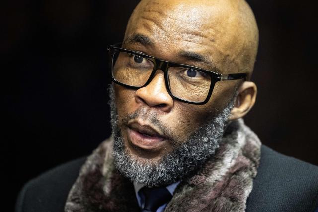 Vusimuzi “Cat” Matlala, suspected of links to organised crime, reacts as he appears for charges linked to an irregular Medicare24 police tender, at the Pretoria Magistrate’s Court in Pretoria on May 13, 2026. (Photo by EMMANUEL CROSET / AFP)