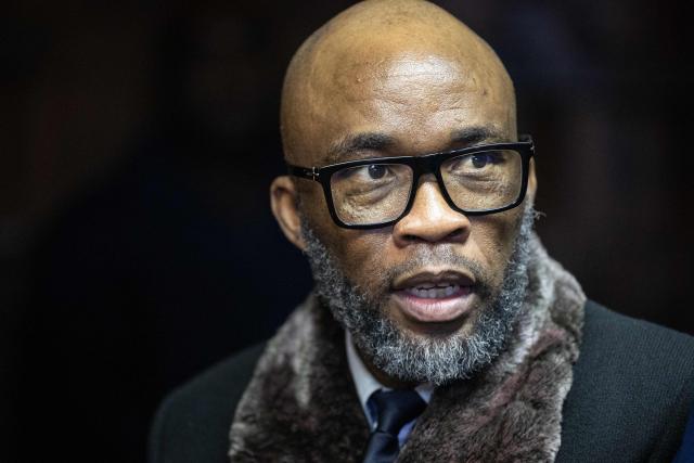 Vusimuzi “Cat” Matlala, suspected of links to organised crime, reacts as he appears for charges linked to an irregular Medicare24 police tender, at the Pretoria Magistrate’s Court in Pretoria on May 13, 2026. (Photo by EMMANUEL CROSET / AFP)