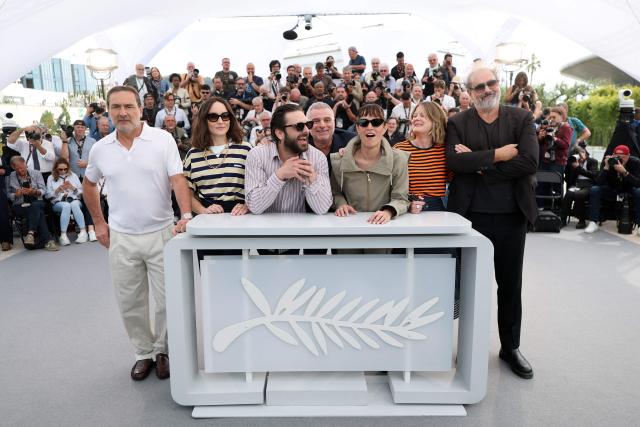 (From L) French actor Gilles Lellouche, French actress Anais Demoustier, French actor Pio Marmai, French film director and screenwriter Pierre Salvadori, French actress Vimala Pons, French actress Madeleine Baudot and French actor Gustave Kervern pose during a photocall of the film "La Venus electrique" (The Electric Kiss)" at the 79th edition of the Cannes Film Festival in Cannes, southern France on May 13, 2026. (Photo by Sameer AL-DOUMY / AFP)