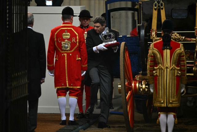 The Imperial State Crown is carried into the Houses of Parliament in London on May 13, 2026, for the State Opening of Parliament.  (Photo by JUSTIN TALLIS / POOL / AFP)