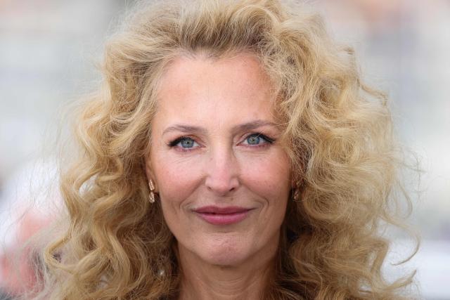 US actress Gillian Anderson poses during a photocall of the film "Teenage Sex and Death at Camp Miasma" at the 79th edition of the Cannes Film Festival in Cannes, southern France on May 13, 2026. (Photo by Valery HACHE / AFP)