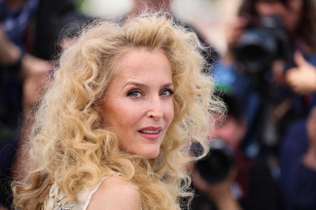 US actress Gillian Anderson poses during a photocall of the film "Teenage Sex and Death at Camp Miasma" at the 79th edition of the Cannes Film Festival in Cannes, southern France on May 13, 2026. (Photo by Valery HACHE / AFP)