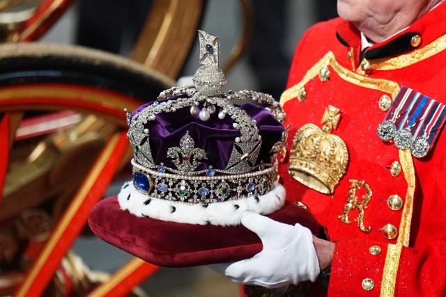 The Imperial State Crown arrives at the Sovereign's Entrance during the State Opening of Parliament at the Houses of Parliament, in London, on May 13, 2026. (Photo by Aaron Chown / POOL / AFP)