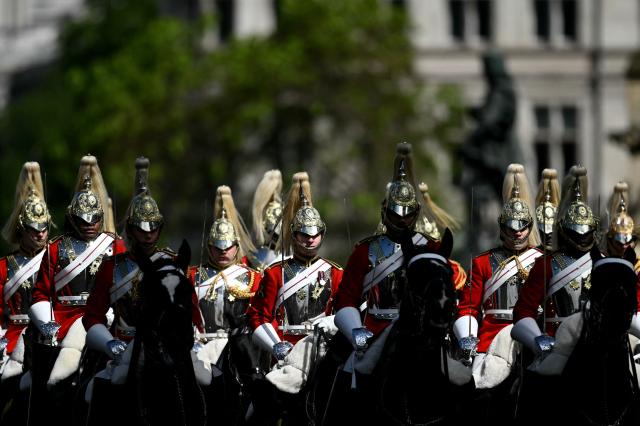 King's Life Guards arrive at the Houses of Parliament in London on May 13, 2026, for the State Opening of Parliament.  (Photo by JUSTIN TALLIS / POOL / AFP)