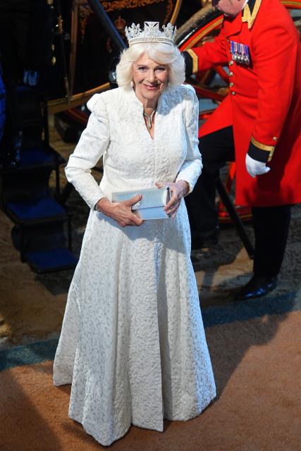 Britain's Queen Camilla wearing the George IV State Diadem arrives at the Sovereign's Entrance during the State Opening of Parliament at the Houses of Parliament, in London, on May 13, 2026. (Photo by Aaron Chown / POOL / AFP)