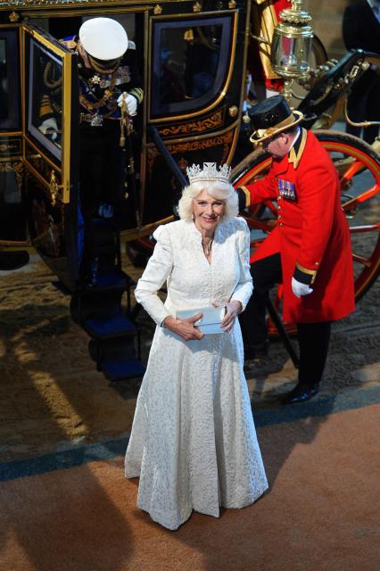 Britain's Queen Camilla wearing the George IV State Diadem arrives at the Sovereign's Entrance during the State Opening of Parliament at the Houses of Parliament, in London, on May 13, 2026. (Photo by Aaron Chown / POOL / AFP)