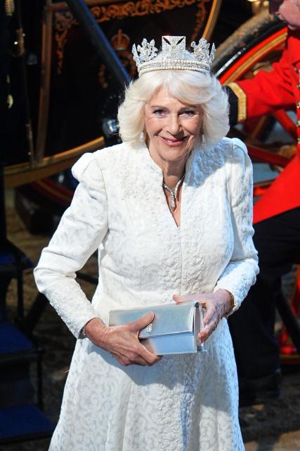 Britain's Queen Camilla wearing the George IV State Diadem arrives at the Sovereign's Entrance during the State Opening of Parliament at the Houses of Parliament, in London, on May 13, 2026. (Photo by Aaron Chown / POOL / AFP)