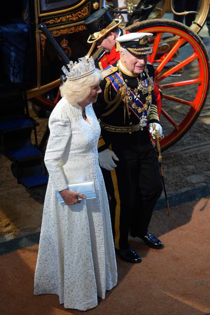 Britain's King Charles III and Britain's Queen Camilla arrive at the Sovereign's Entrance during the State Opening of Parliament at the Houses of Parliament, in London, on May 13, 2026. (Photo by Aaron Chown / POOL / AFP)