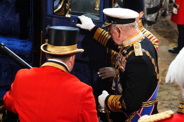 Britain's King Charles III departs following the State Opening of Parliament, at the Houses of Parliament, in London on May 13, 2026. (Photo by Aaron Chown / POOL / AFP)