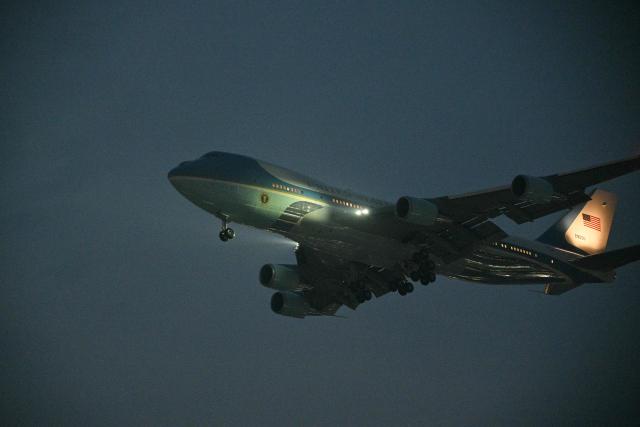 Air Force One, carrying US President Donald Trump, arrives at Beijing Capital Airport in Beijing on May 13, 2026. (Photo by HECTOR RETAMAL / AFP)