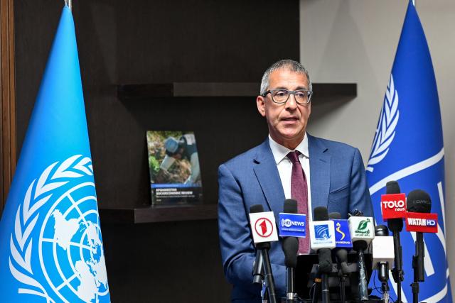 United Nations Development Programme (UNDP) Head of the Policy, Innovation and Knowledge Unit Peter Chaudhry addresses the UNDP Afghanistan Socio-Economic Review (ASER) 2024–2025 in Kabul on May 13, 2026. (Photo by Bais YUSUFI / AFP)