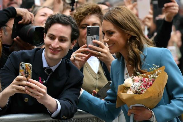 Britain's Catherine, Princess of Wales greets people outside Reggio Emilia's town hall as part of a two-day visit in Italy, on May 13, 2026. (Photo by Marco BERTORELLO / POOL / AFP)