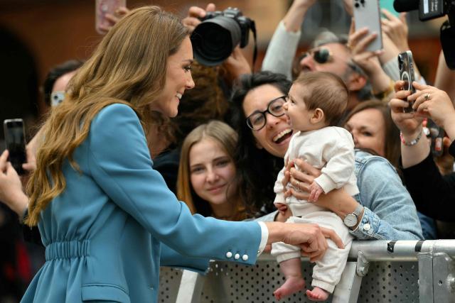 Britain's Catherine, Princess of Wales greets people outside Reggio Emilia's town hall as part of a two-day visit in Italy, on May 13, 2026. (Photo by Marco BERTORELLO / POOL / AFP)