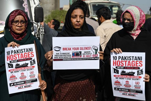 Families of Pakistan's crew members of an oil tanker seized by pirates in Somalia demonstrate during a protest near Karachi Port Trust (KPT) in Karachi on May 13, 2026, urging the government to ensure the safe return of their loved ones. (Photo by Rizwan TABASSUM / AFP)