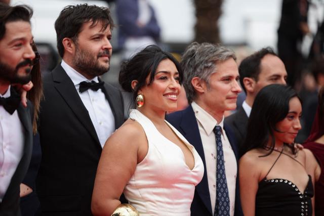 (From L) Mexican director, actor, producer and screenwriter Diego Luna, Mexican screenwriter and producer Diego Rabasa, Mexican actress Adriana Paz, Mexican actor Gael Garcia Bernal and Mexican actress Anna Diaz arrive for the screening of the film "Ceniza en la Boca" at the 79th edition of the Cannes Film Festival in Cannes, southern France on May 13, 2026. (Photo by Valery HACHE / AFP)