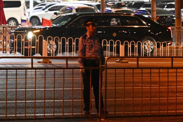 US President Donald Trump's motorcade arrives at the Four Seasons Hotel in Beijing on May 13, 2026. (Photo by Pedro PARDO / AFP)