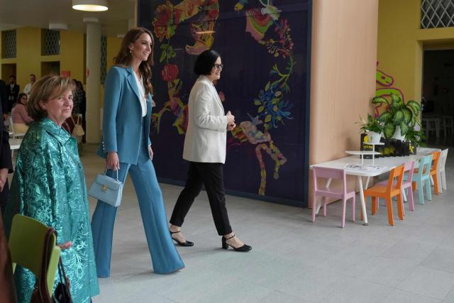 Britain's Kate, Princess of Wales, arrives at the Loris Malaguzzi International Centre and will take part in an immersive clay atelier workshop, part of a two-day trip, in Reggio Emilia, Italy, on May 13, 2026. (Photo by Antonio Calanni / POOL / AFP)