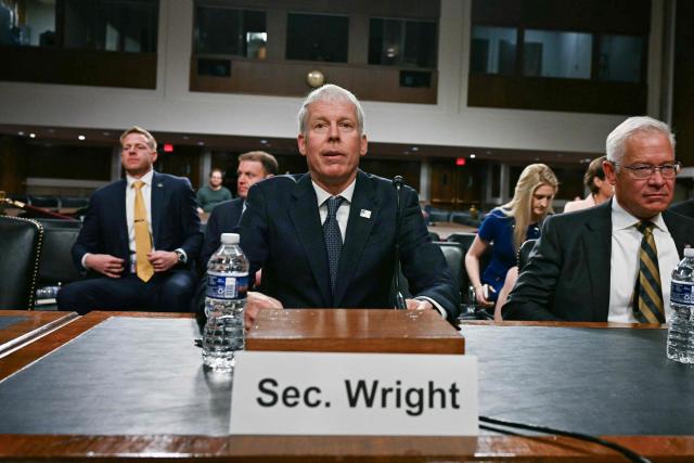US Secretary of Energy Chris Wright (C) prepares to testify before a Senate Committee on Armed Services hearing to examine the 2027 budget for the Department of Energy and National Nuclear Security Administration on Capitol Hill in Washington, DC, on May 13, 2026. (Photo by Jim WATSON / AFP)