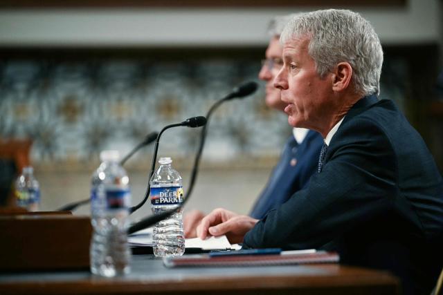 (L-R) Under Secretary of Energy for Nuclear Security and Administrator National Nuclear Security Administration Brandon M. Williams and US Energy Secretary Chris Wright testify before a Senate Committee on Armed Services Committee hearing to examine the 2027 budget for the Department of Energy and National Nuclear Security Administration on Capitol Hill in Washington, DC, on May 13, 2026. (Photo by Jim WATSON / AFP)
