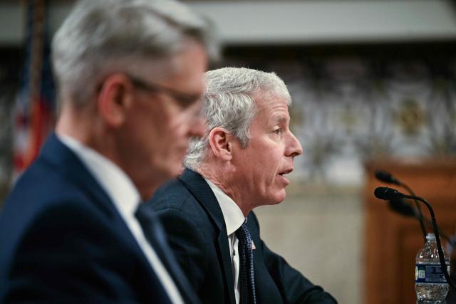 (L-R) Under Secretary of Energy for Nuclear Security and Administrator National Nuclear Security Administration Brandon M. Williams and US Energy Secretary Chris Wright testify before a Senate Committee on Armed Services Committee hearing to examine the 2027 budget for the Department of Energy and National Nuclear Security Administration on Capitol Hill in Washington, DC, on May 13, 2026. (Photo by Jim WATSON / AFP)