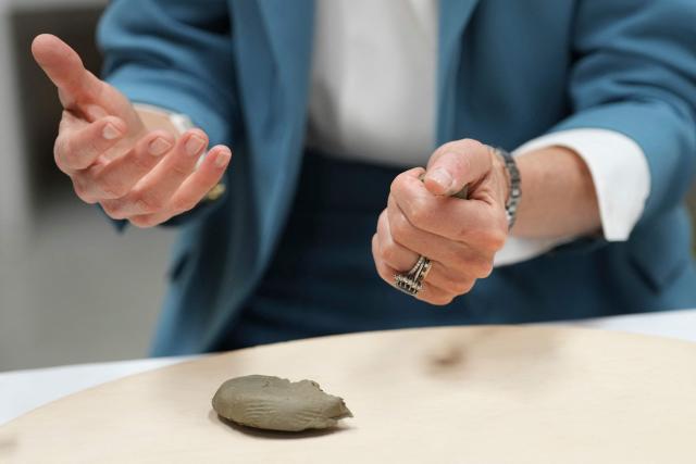 Britain's Kate, Princess of Wales, takes part in an immersive clay atelier workshop at the Loris Malaguzzi International Centre, part of a two-day trip, in Reggio Emilia, Italy, on May 13, 2026. (Photo by Antonio Calanni / POOL / AFP)