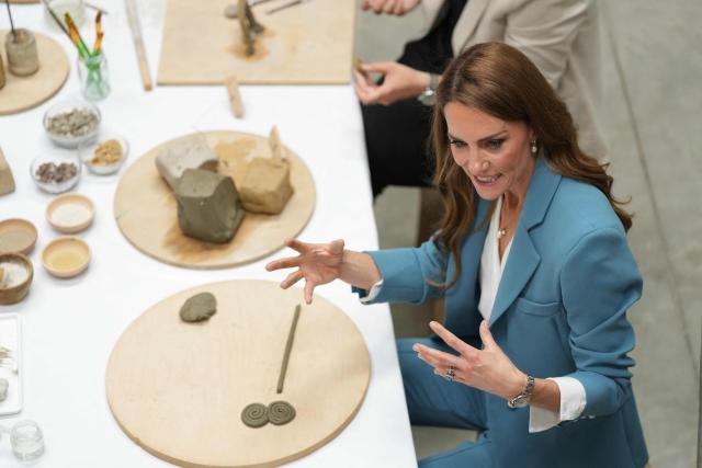 Britain's Catherine, Princess of Wales, takes part in an immersive clay atelier workshop at the Loris Malaguzzi International Centre, part of a two-day trip, in Reggio Emilia, Italy, on May 13, 2026. (Photo by Antonio Calanni / POOL / AFP)