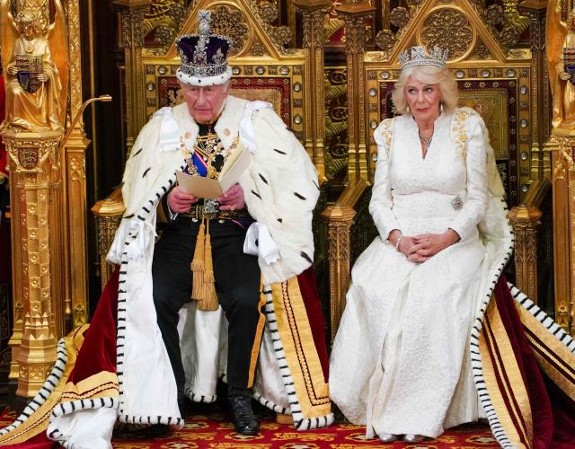 Britain's King Charles III, wearing the Imperial State Crown and the Robe of State, reads the King's Speech in the House of Lords chamber, during the State Opening of Parliament, at the Houses of Parliament, in London on May 13, 2026. (Photo by Arthur Edwards / POOL / AFP)
