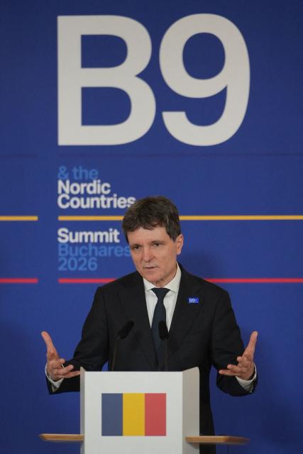 Romania's President Nicusor Dan speaks during a press conference at the summit of the Bucharest Nine (B9) and the Nordic countries at the Cotroceni Palace in Bucharest, Romania on May 13, 2026. The event is co-chaired by the President of Romania and the President of Poland under the overarching theme of 'Delivering More for Transatlantic Security' and is focusing on transatlantic security and NATOs forthcoming summit in Ankara. The B9 format, also known as NATO's Eastern Flank, includes Bulgaria, the Czech Republic, Estonia, Hungary, Latvia, Lithuania, Poland, Romania and Slovakia. (Photo by Mihai Barbu / AFP)