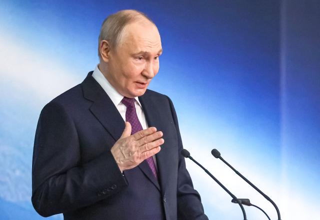 In this pool photograph distributed by the Russian state agency Sputnik, Russia's President Vladimir Putin gives a speech during a ceremony to award staff of the Moscow Institute of Thermal Technology - Russian ballistic missiles developer, on the outskirts of Moscow on May 13, 2026. (Photo by Vyacheslav PROKOFYEV / POOL / AFP)
