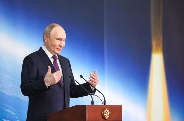 In this pool photograph distributed by the Russian state agency Sputnik, Russia's President Vladimir Putin gives a speech during a ceremony to award staff of the Moscow Institute of Thermal Technology - Russian ballistic missiles developer, on the outskirts of Moscow on May 13, 2026. (Photo by Vyacheslav PROKOFYEV / POOL / AFP)