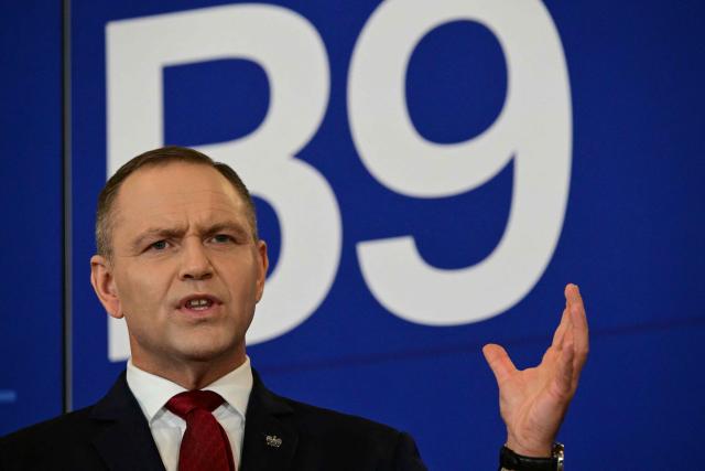 Poland's President Karol Nawrocki speaks during a press conference at the summit of the Bucharest Nine (B9) and the Nordic countries at the Cotroceni Presidential Palace in Bucharest, Romania on May 13, 2026. The event is co-chaired by the President of Romania and the President of Poland under the overarching theme of 'Delivering More for Transatlantic Security' and is focusing on transatlantic security and NATOs forthcoming summit in Ankara. The B9 format, also known as NATO's Eastern Flank, includes Bulgaria, the Czech Republic, Estonia, Hungary, Latvia, Lithuania, Poland, Romania and Slovakia. (Photo by Daniel MIHAILESCU / AFP)