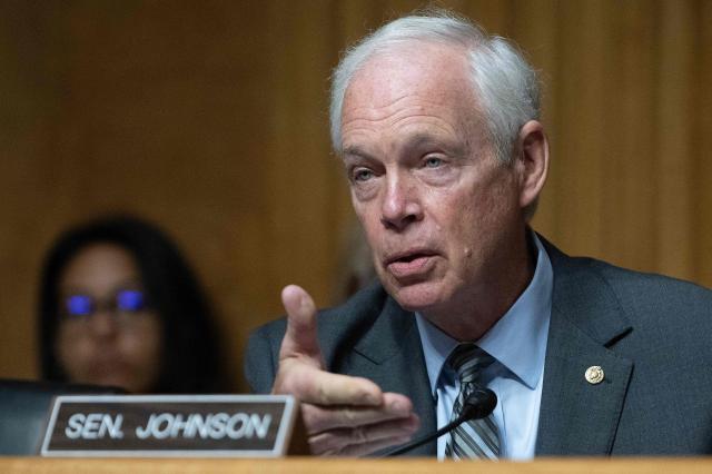 US Senator Ron Johnson, Republican from Wisconsin, speaks as James Erdman III, senior operations officer at the CIA, testifies during a Senate Homeland Security and Governmental Affairs Committee hearing on Capitol Hill in Washington, DC, on May 13, 2026. Erdman testified that he believes there was an effort within the Intelligence Community to downplay the possibility that the COVID-19 pandemic originated in a "lab leak." (Photo by Jim WATSON / AFP)