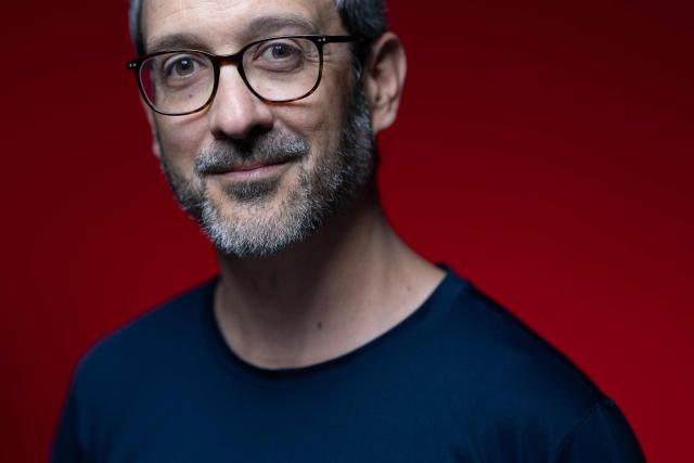 French cartoonist and co-creator of the comic strip "Anatole Latuile", Clement Devaux poses during a photo session in Paris on May 12, 2026. (Photo by Joel Saget / AFP)