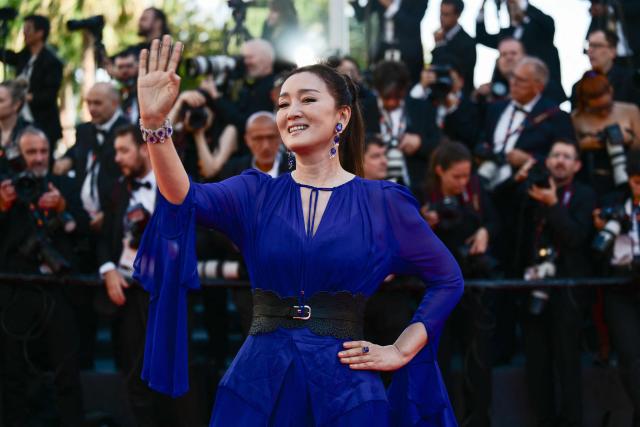 Chinese actress Gong Li arrives for the screening of the film "La Vie d'une femme" (A Woman's Life) at the 79th edition of the Cannes Film Festival in Cannes, southern France on May 13, 2026. (Photo by Olivier CHASSIGNOLE / AFP)