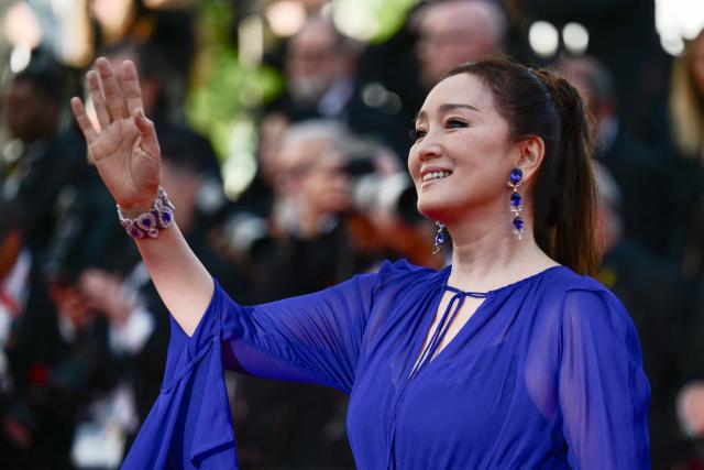 Chinese actress Gong Li arrives for the screening of the film "La Vie d'une femme" (A Woman's Life) at the 79th edition of the Cannes Film Festival in Cannes, southern France on May 13, 2026. (Photo by Olivier CHASSIGNOLE / AFP)